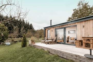 The large sliding doors invite the outside in.
