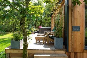 Complete with a bubbling hot tub to enjoy this rural bliss from.