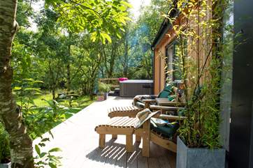The large deck is a perfect place to enjoy the glorious view and tranquil surroundings.