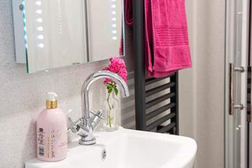 Complete with motion-sensor backlit mirror.