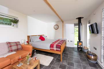 The living area is spacious, with sliding patio doors maximising the view.