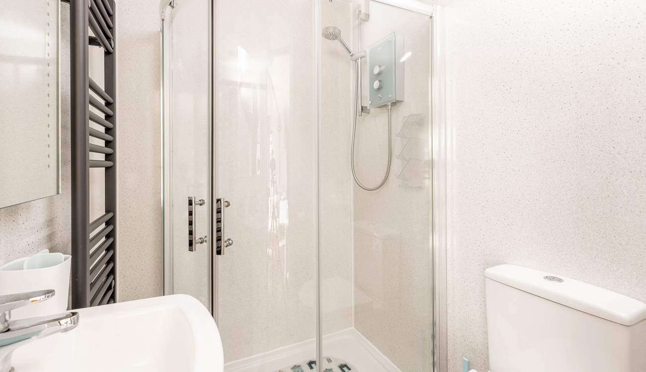 The sleek shower room is just the spot for freshening up after a day of exploring the coast.