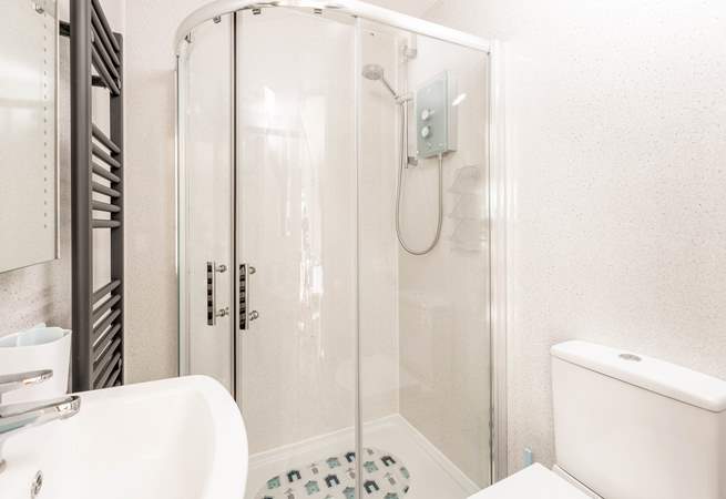 The sleek shower room is just the spot for freshening up after a day of exploring the coast.