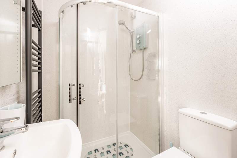 The sleek shower room is just the spot for freshening up after a day of exploring the coast.