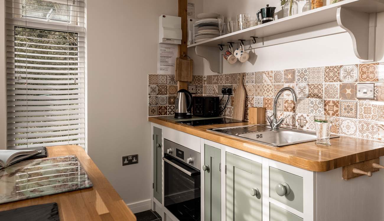 Rustle up an intimate dinner in the lovely kitchen.