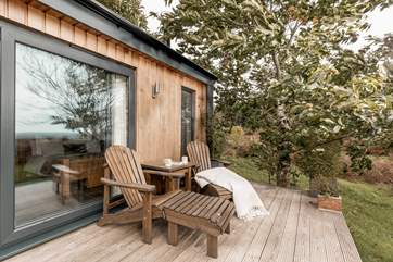 Sip your morning brew and soak in this tranquil woodland setting.