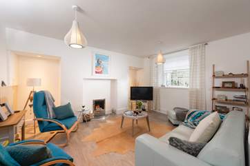 The comfortable sitting room is spacious and light.