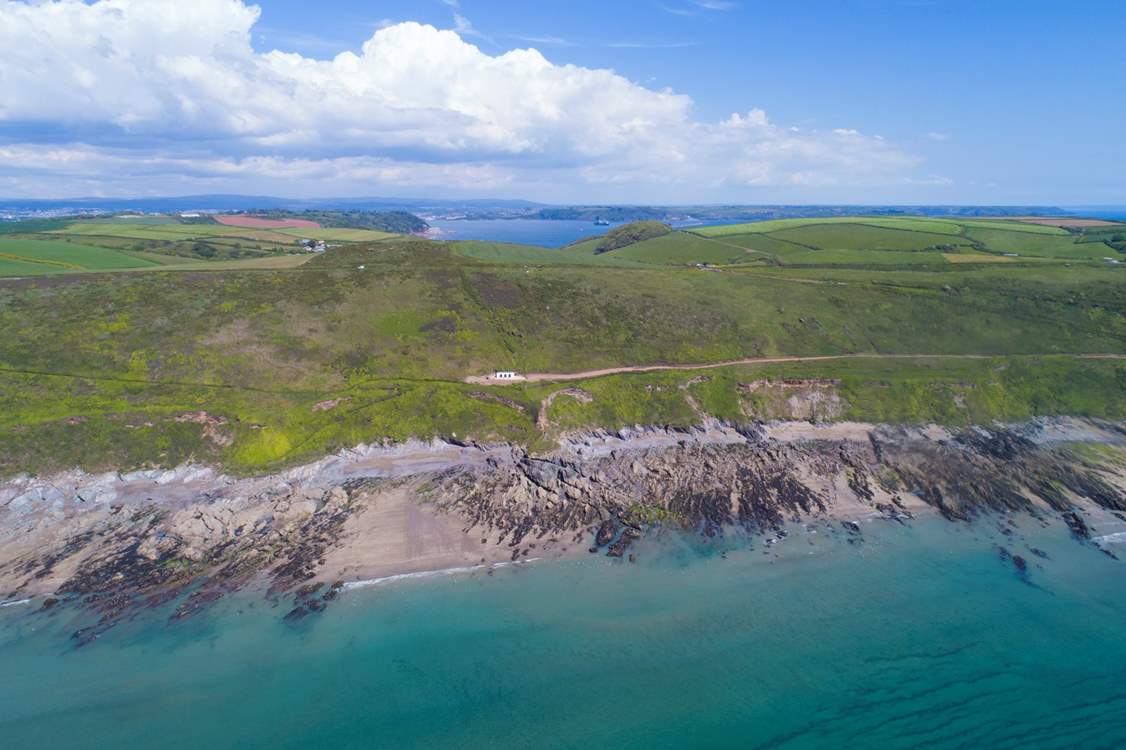 Perched high on the cliff, above stunning Whitsand Bay with no near neighbours and reached only by foot, this is second to none.