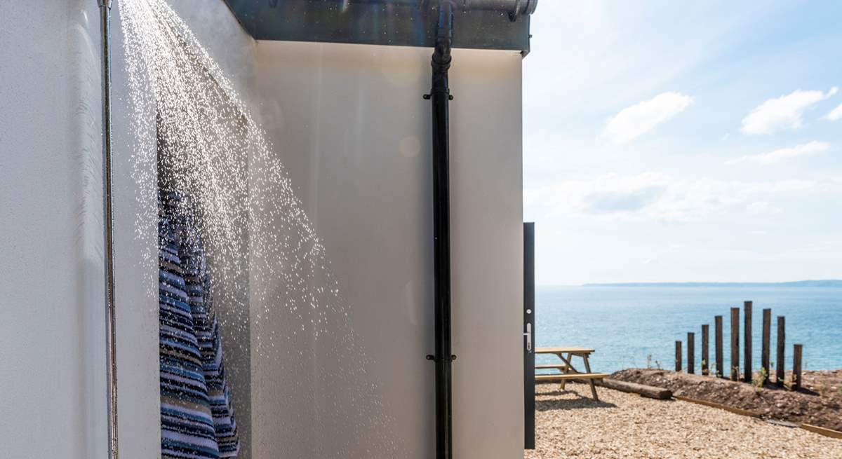 The outdoor shower is ideal for rinsing off sandy dogs and bodies.