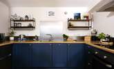 Very well-equipped, the kitchen includes an electric cooker, microwave, dishwasher and fridge (with freezer). - Thumbnail Image