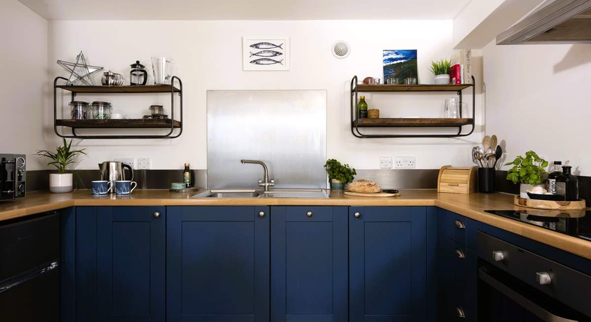 Very well-equipped, the kitchen includes an electric cooker, microwave, dishwasher and fridge (with freezer).