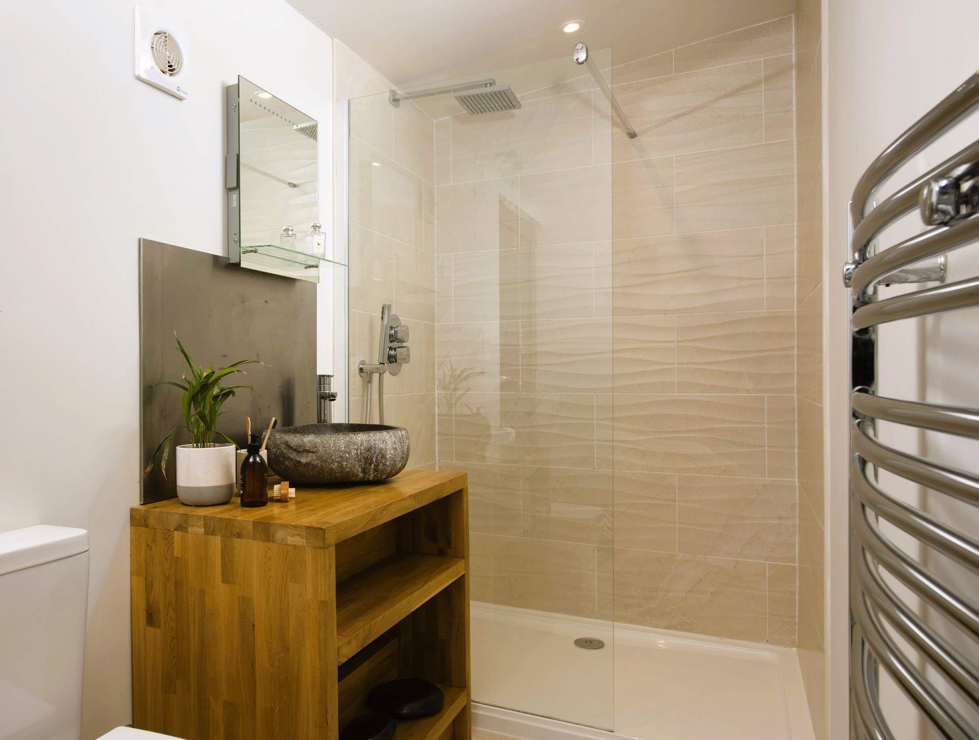 There's a surprisingly spacious shower room, 