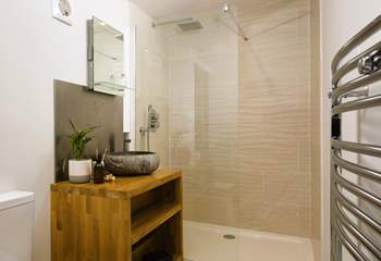 There's a surprisingly spacious shower room, 