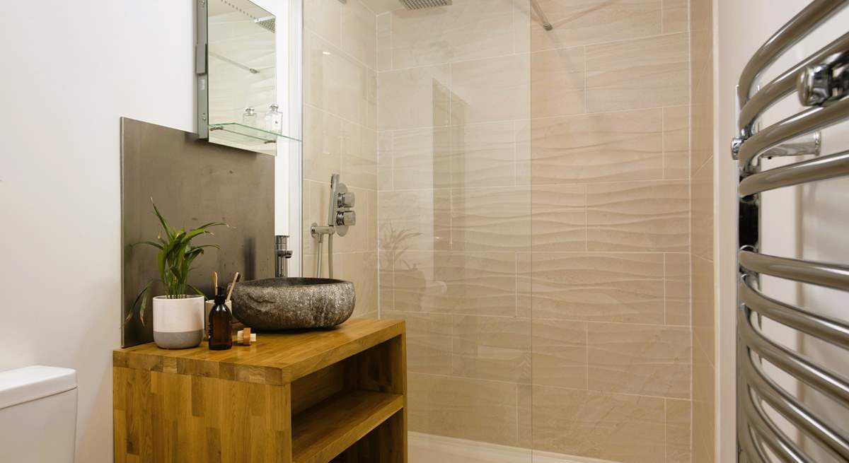There's a surprisingly spacious shower room, 