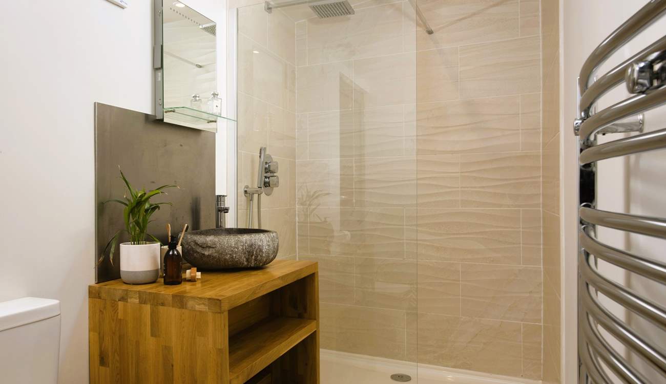 There's a surprisingly spacious shower room, 