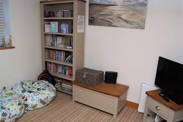 The snug has a TV and bean bags as well as lots of games for the whole family.