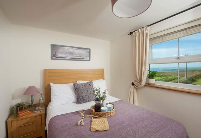 Enjoy the sea views from this bedroom.