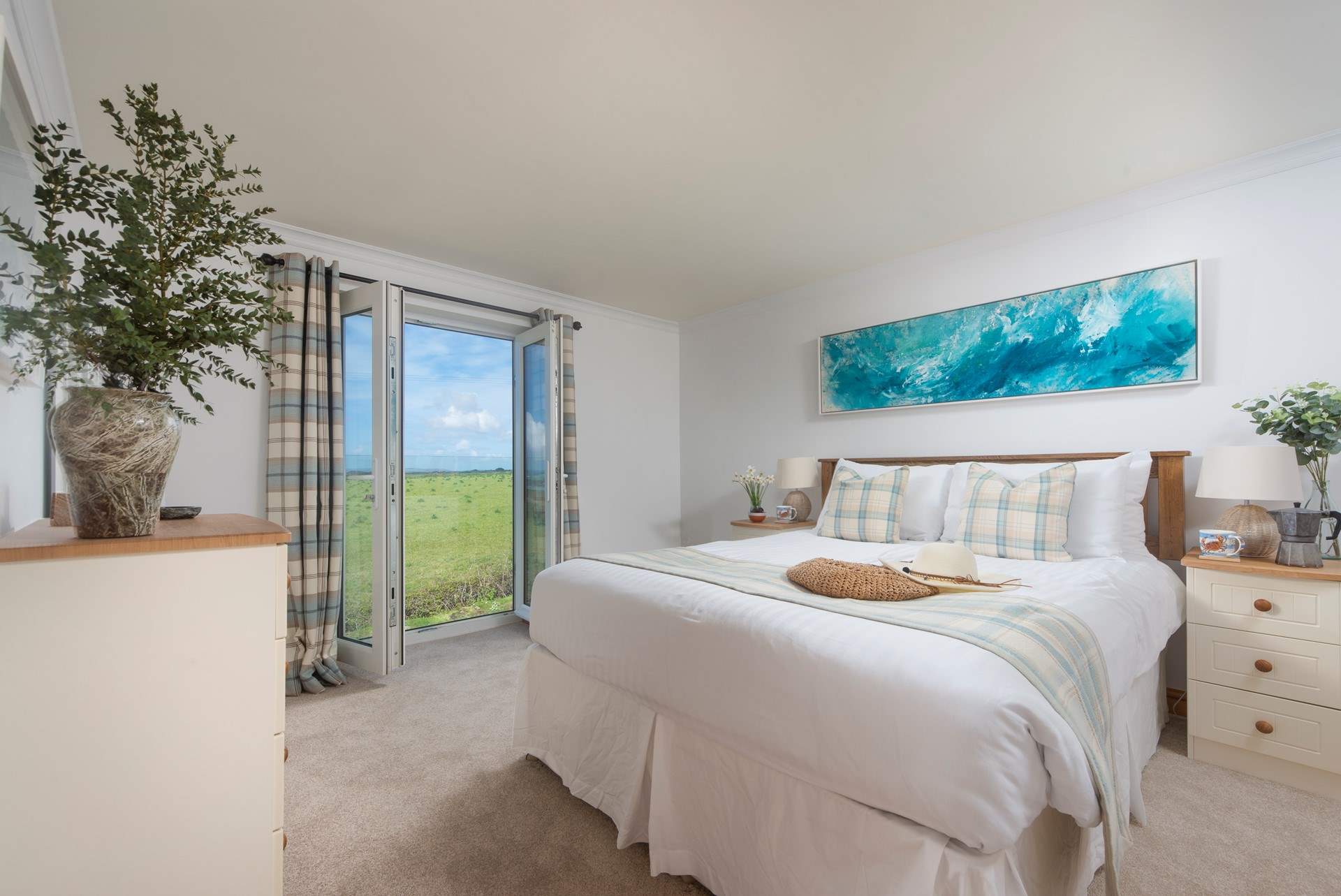 The en suite bedroom has a lovely Juliette balcony to make the most of the stunning views,