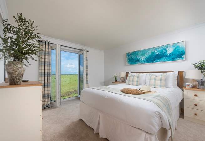 The en suite bedroom has a lovely Juliette balcony to make the most of the stunning views,