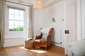 Comfort and calm in front of the wood-burner.