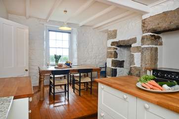 The kitchen/dining-room (a step leads up to the dining area).