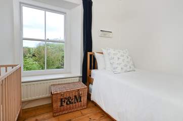 The single bedroom also has a full cot.