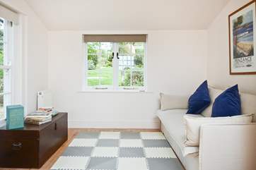 The far end of the sitting-room.