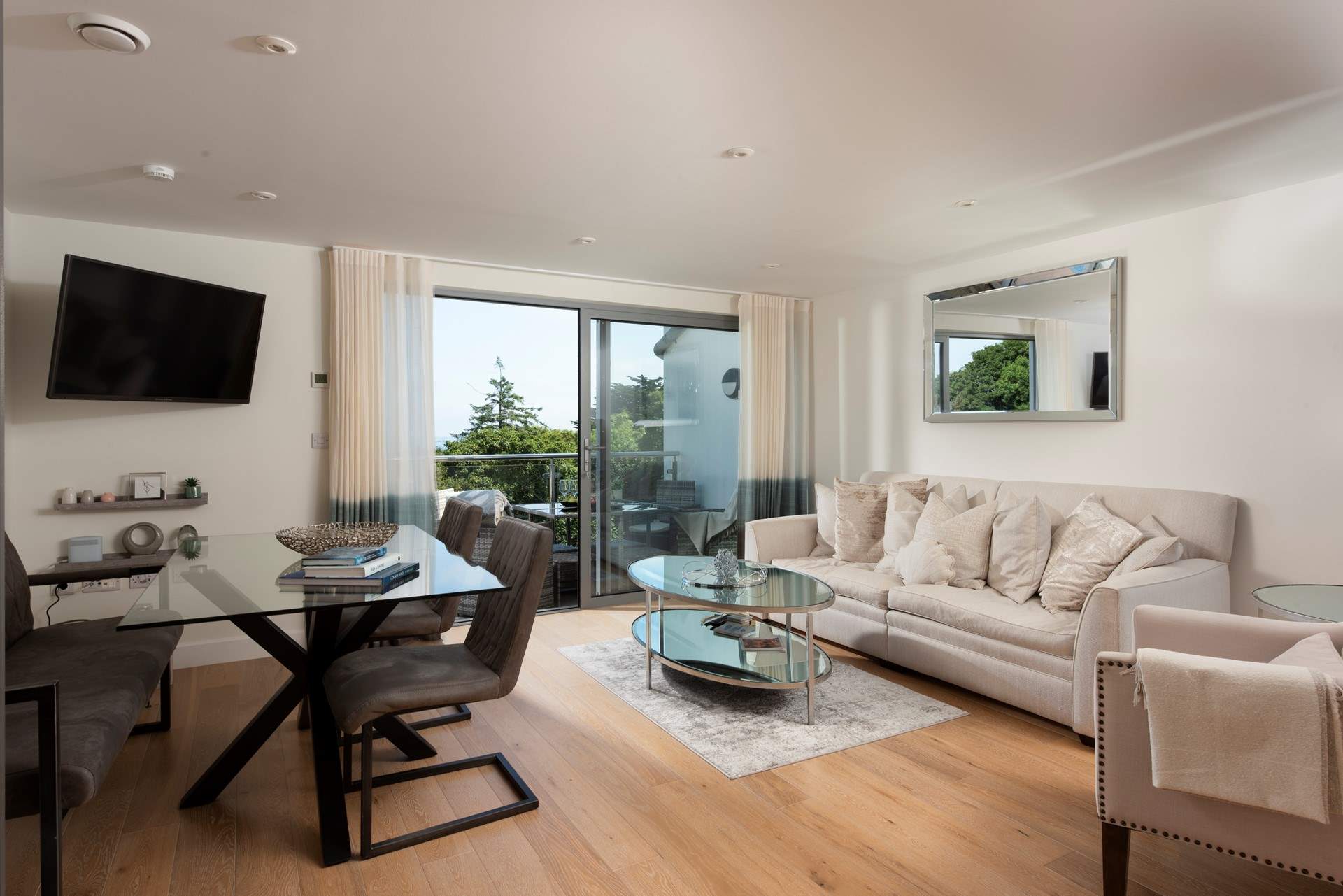 The living space leads out onto the balcony, let the sea air in!