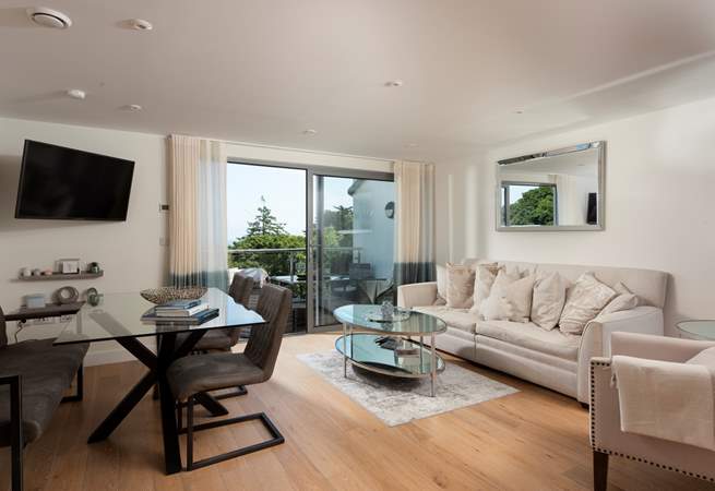 The living space leads out onto the balcony, let the sea air in!