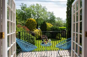 French doors open out to the granite terrace and garden.