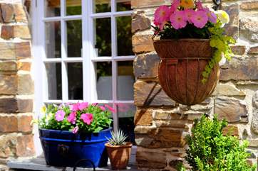 There are lots of pretty planted pots and window boxes.