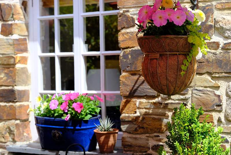 There are lots of pretty planted pots and window boxes.