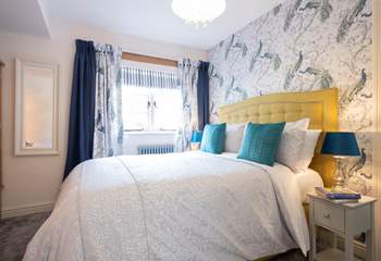 The bedroom has a super-comfy king-size bed.