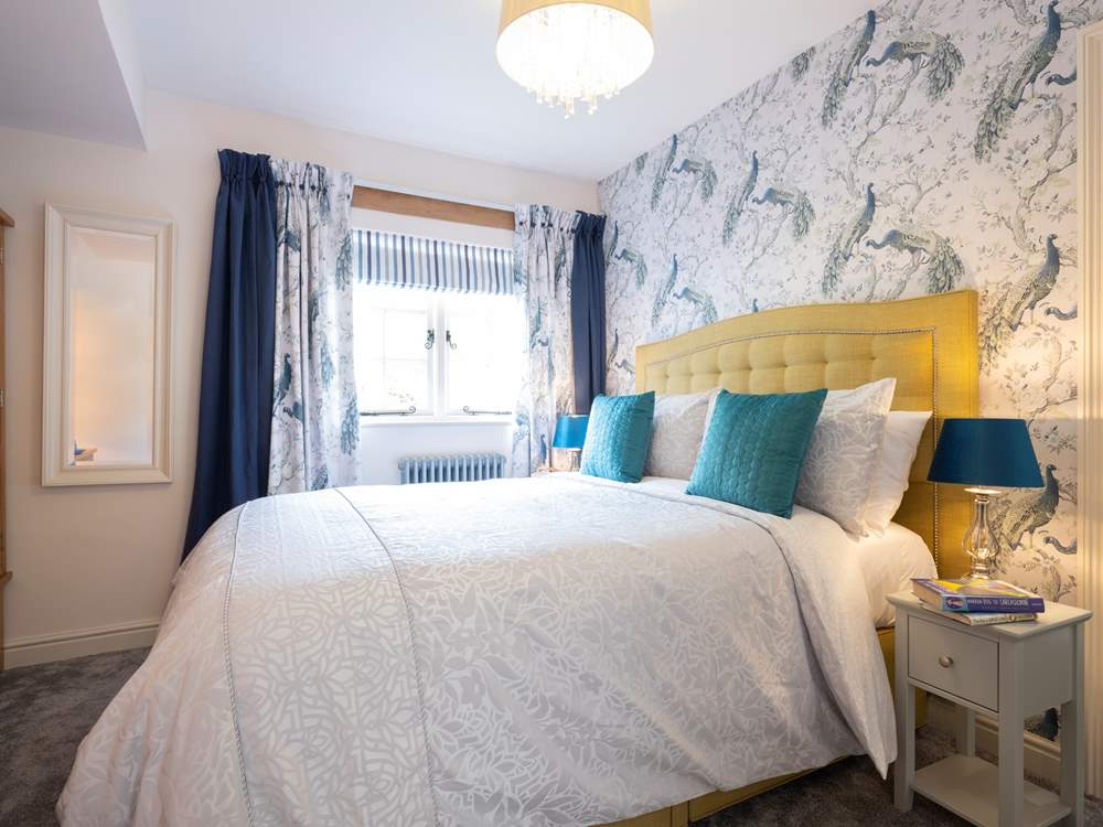 The bedroom has a super-comfy king-size bed.