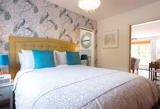 Looking through to the en suite bathroom and living-room.