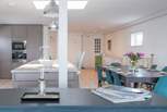 Presented to a very high standard, the open plan kitchen and living-room provide a light, bright social space.