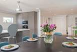 Socialise with friends and family alike in the kitchen/dining area.