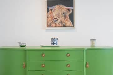 Abstract animal portraits adorn the walls.