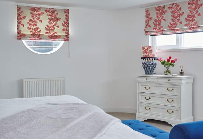 The bright and airy main bedroom with super-king bed and lovely details.