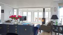 Double doors open out onto the bow of the boat with the choice of al fresco dining around the teak table and chairs.