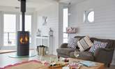 The open, bright living space affords guests a generous space to enjoy.   - Thumbnail Image