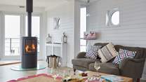The open, bright living space affords guests a generous space to enjoy.  