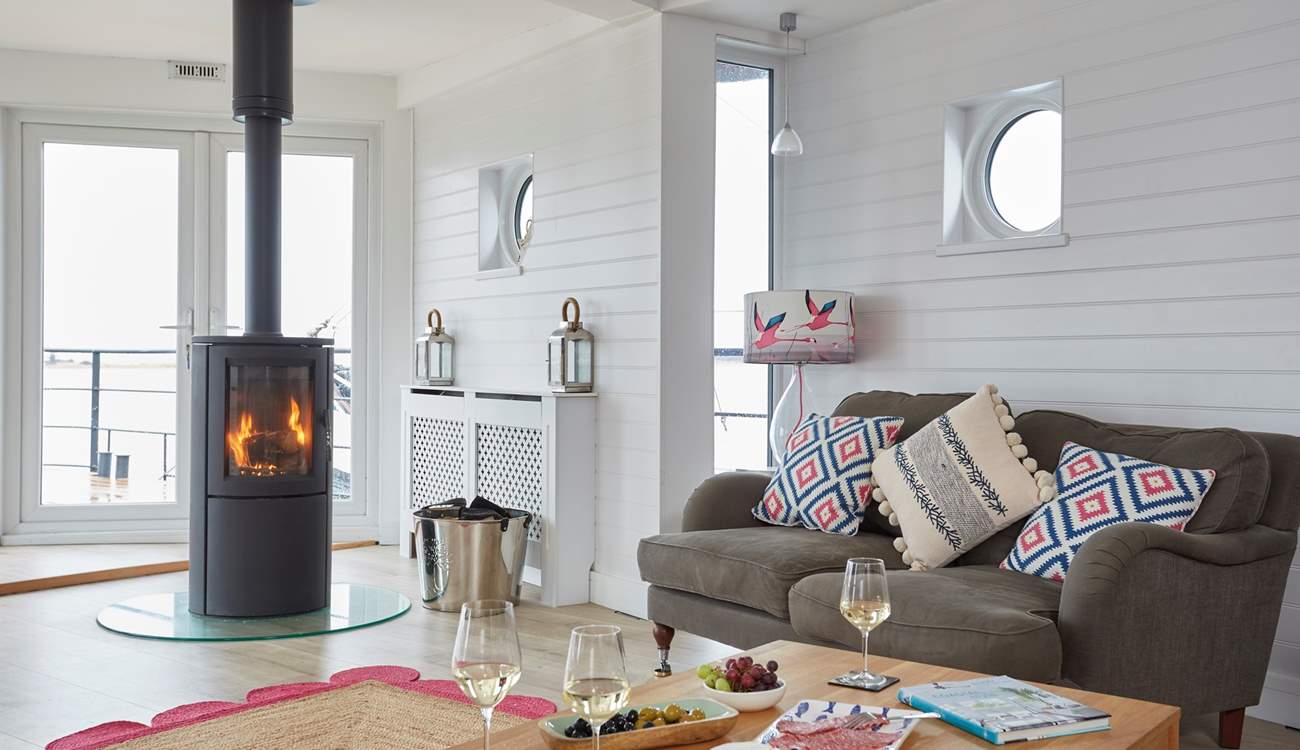 The open, bright living space affords guests a generous space to enjoy.  