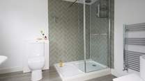 The main bedroom has a superb en suite bathroom with bath and separate shower cubicle.