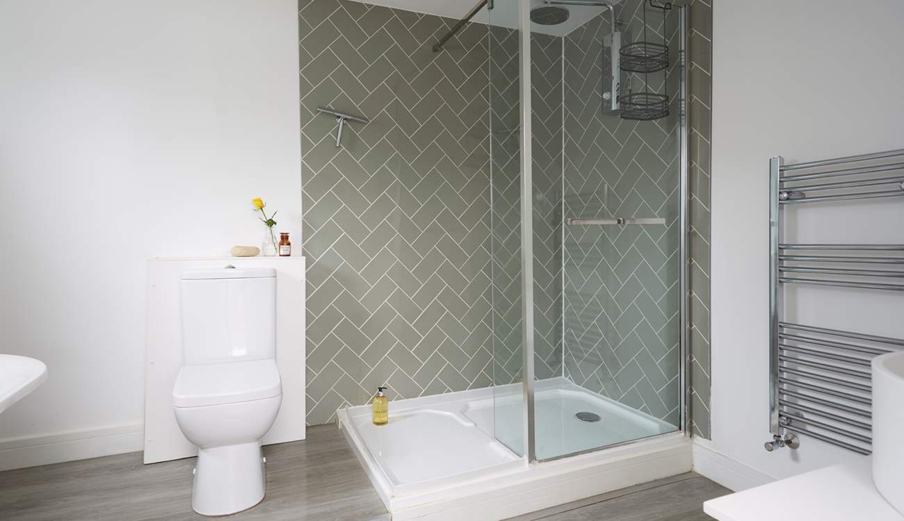 The main bedroom has a superb en suite bathroom with bath and separate shower cubicle.