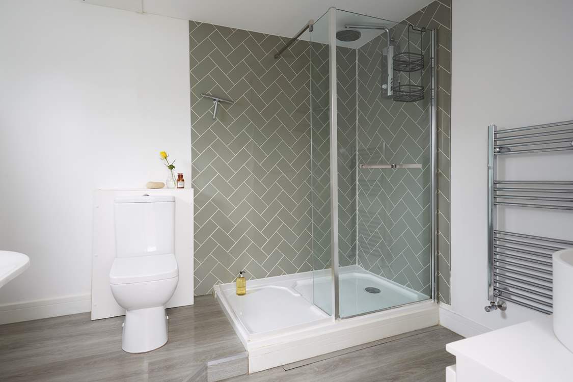 The main bedroom has a superb en suite bathroom with bath and separate shower cubicle.