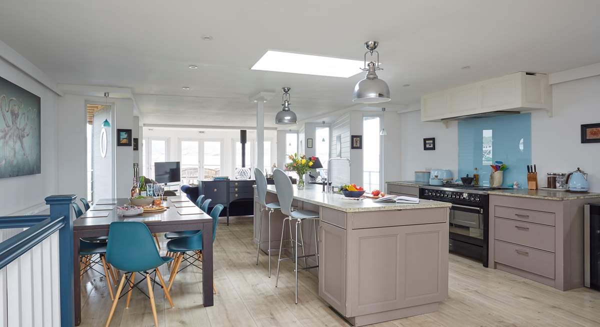 Presented to a very high standard, the open-plan kitchen and living-room provide a light, bright social space.