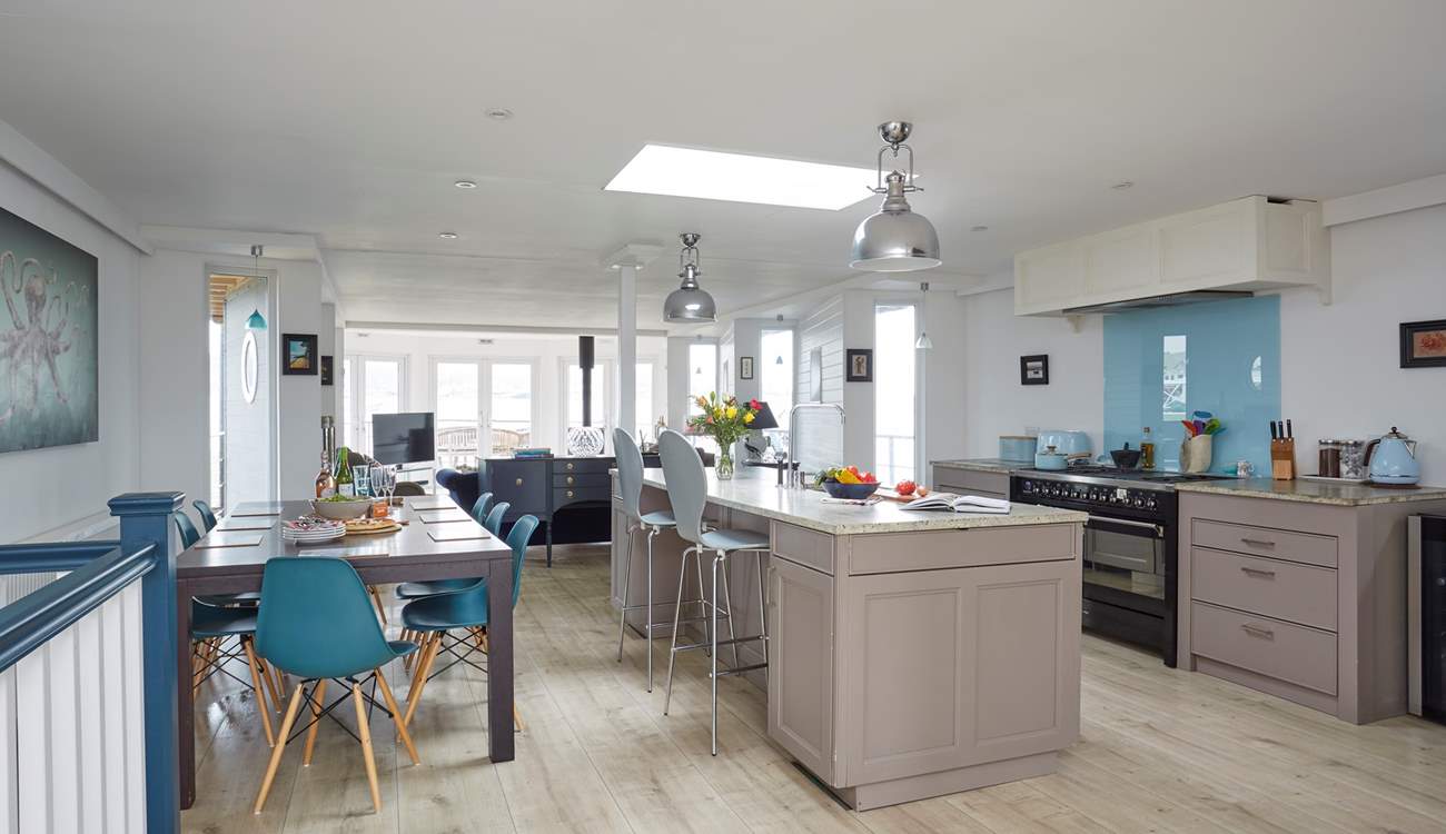 Presented to a very high standard, the open-plan kitchen and living-room provide a light, bright social space.