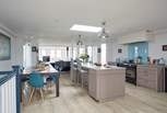 Presented to a very high standard, the open plan kitchen and living-room provide a light, bright social space.