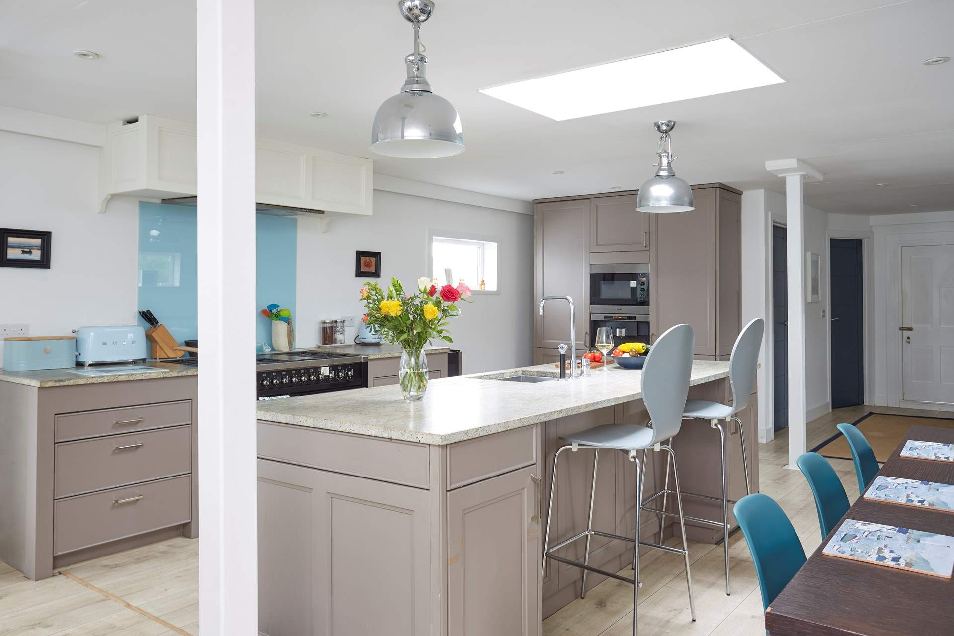 The kitchen has all the modern appliances needed to make a delicious meal at home.